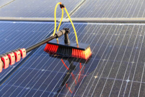 special brush cleaning solar panels on roof