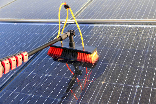 special brush cleaning solar panels on roof